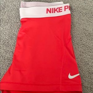 red nike pros